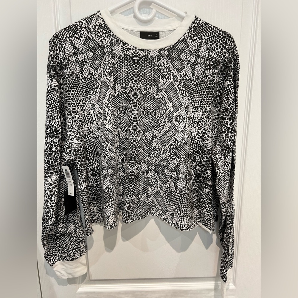 Women’s TNA sweater